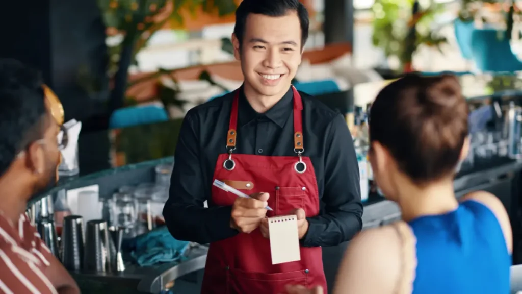 Percakapan santai memesan makanan dalam Bahasa Inggris di sebuah kafe modern yang estetik.